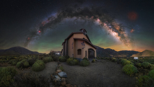 View of Ermita de las Nieves chapel under a vibrant Milky Way galaxy in Teide National Park, Santa Cruz de Tenerife, Canary Islands, Spain.