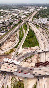 Aerial drone video Miami highway. Golden Glades Interchange project 2026. Vertical stock video 4k 24fps