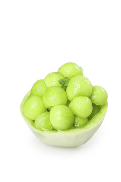 Fresh Green Melon Balls in Natural Melon Bowl - Healthy Fruit Preparation
