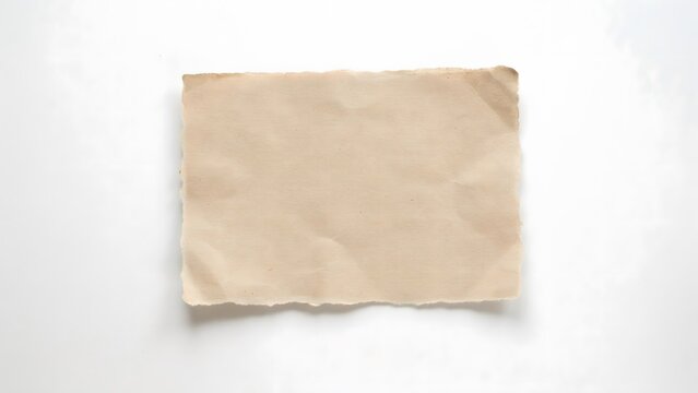 A piece of old, textured, vintage paper with torn edges, isolated on white background