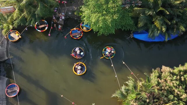 Fishing Scene With Traditional Boats. Asian Fishermen Paddling Coracles Near Reed Beds. Rustic Aerial View Of Asian Fishermen Catching Fish With Coracles Near Reed Regions