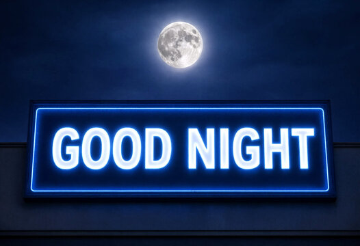 Bright glowing good night sign with a full moon shining beautifully in the night sky scene