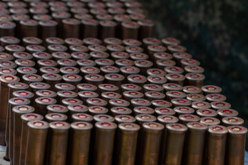 Rifle ammunition bullets row closeup texture background target shooting sport training view.  © Yar