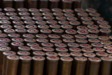 Rifle ammunition bullets row closeup texture background target shooting sport training view.  © Yar