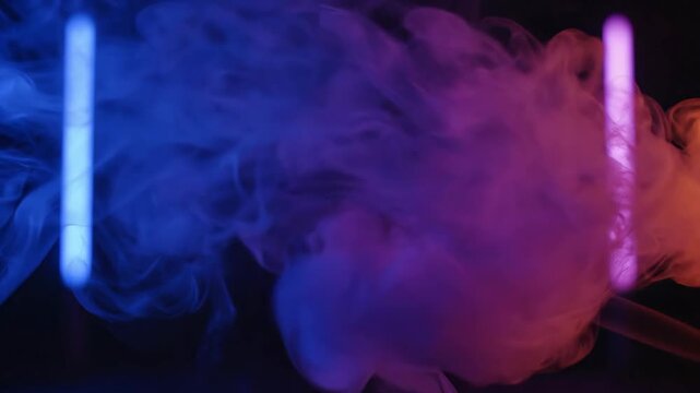 Abstract visual featuring colored smoke plumes dancing around neon lights with blue and purple glows in a dark environment showcasing vaporous movement