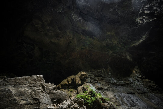 View of the limestone rock formations and lush green vegetation inside the Reserve speciale d'Ankarana cave in Diana, Madagascar.