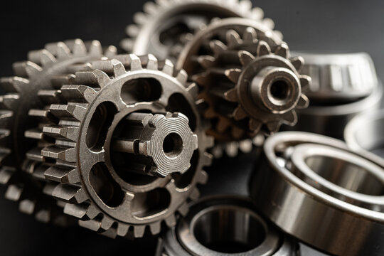 Gear and cogs wheels, clock mechanism, brass metal engine industrial.