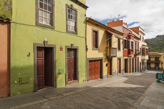 Teror, Spain - 26 December 2025: View of the colorful historic buildings and cobblestone streets in the town of Teror, Canary Islands, Spain.