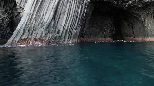 Nanatsugama Cliffs in Saga, Japan &mdash; Dramatic Aerial Drone View of Basalt Sea Cliffs and Caves on the Genkai Sea
