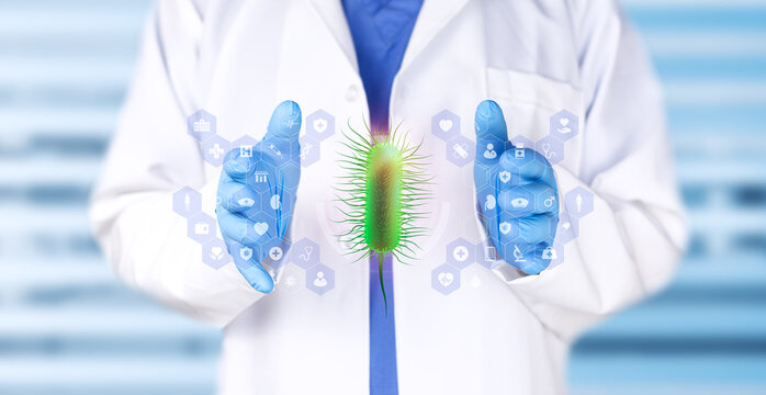 Doctor examining E. coli bacteria. Background with medical technology, urinary tract infection, urology and microbiology with a soft bokeh effect.