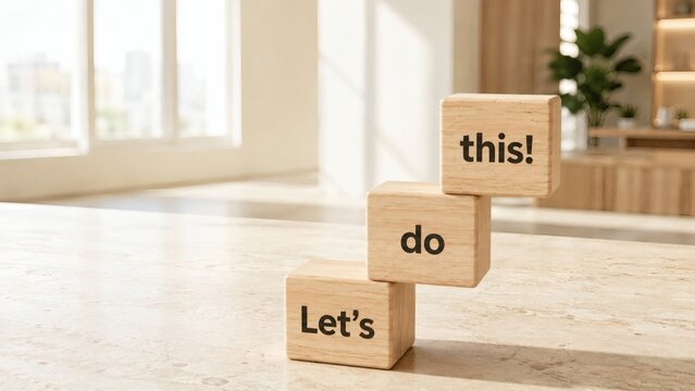 Let's Do This Blocks: Stacked wooden blocks with the words Let's, do, and this! create an inspiring message of action and motivation, set against a bright, airy background.