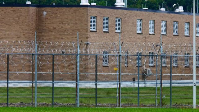 Southern Ohio Correctional Institute, maximum security prison in Lucasville, Ohio, guard tower and razor-wire fence.