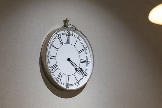 Wall clock with Roman numerals