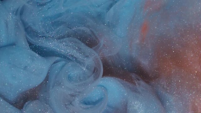 Shimmer blend texture. Haze splash art. Blur blue orange colorful paint glitter cloud bright pigment spreading on abstract bokeh background.