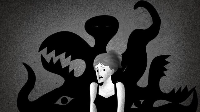 frightened woman with schizophrenia seeing a monstrous shadow with tentacles and mouths