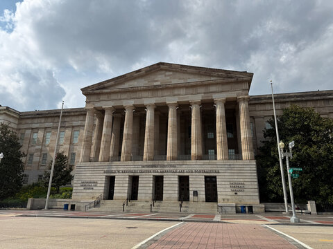 Facade of the Smithsonian National Portrait Gallery beneath a cloudy sky - Washington, District of Columbia, USA - July 28, 2026