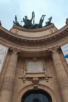 Paris, France - 03 April 2026: View of the ornate stone facade and bronze quadriga sculpture atop the historic Grand Palais.