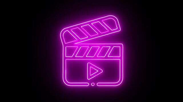 Neon pink film clapper board with play symbol lights up on black background, dynamic motion for film and video concepts.