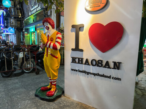 Bangkok, Thailand - May 31, 2026: Ronald McDonald Statue Near Khaosan Road Sign