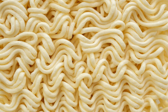 dry instant noodles texture background close up