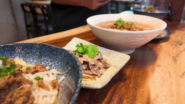 Taiwanese Minced Pork Noodles and Soup on Restaurant Table