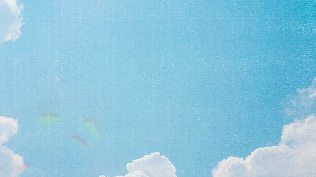 Animated blue sky background loop with soft white clouds and subtle video noise texture