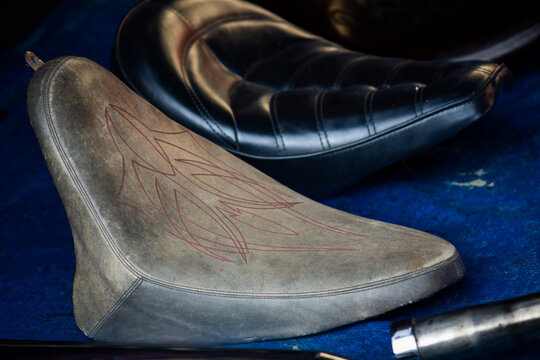 Custom Vintage Motorcycle Leather Seat with Hand Drawn Flame Design and Classic Cruiser Styling