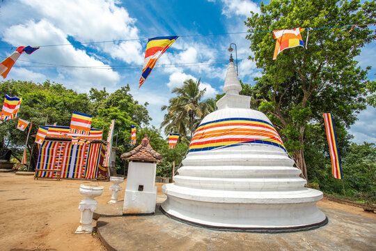 Traditional White Pagoda Under a Blue Sky at Degaldoruwa Temple kandy, Sri Lanka