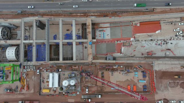 T2D South Road Project Aerial top down tracking over cranes and TBM in launch box