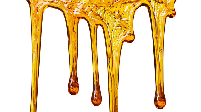 Golden viscous honey dripping in strands, isolated on transparent background