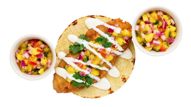 Crispy fish taco with mango salsa and crema, isolated on transparent background