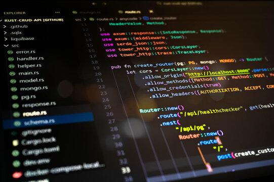 Abstract close-up of colorful programming code displayed in a software development environment, representing backend development, system logic, web services and modern digital technology concepts.