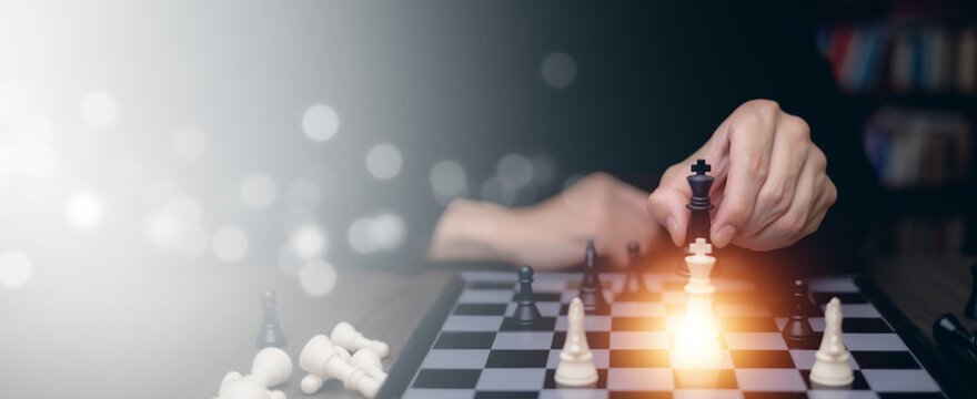 Business strategy concept with chess pieces representing leadership, decision making, competitive planning, risk management and strategic moves for long-term business success.
