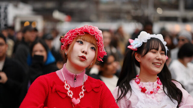 Two Young Japanese Women in Colorful Harajuku Street Fashion Outfits
