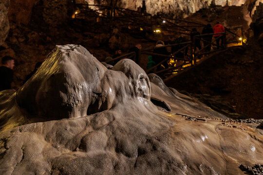 Stalagmite inside the Valporquero Cave called the ghost, Vegacervera, Le&oacute;n, Spain.