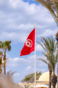 the Tunisian flag against the sky