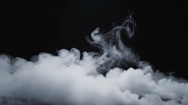 Billowing white smoke and swirling fog on a black background