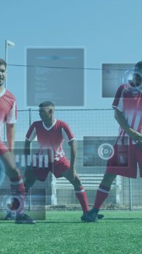 Animation of scopes and data processing on screens over male football players warming up