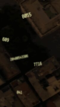 Animation of falling numbers over cityscape