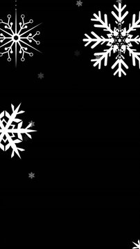 Animation of snow falling over bauble at christmas
