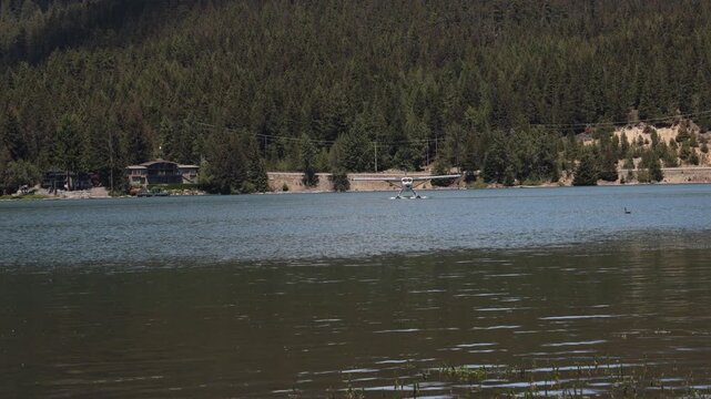 Seaplane landing on the water, front view floating on the water