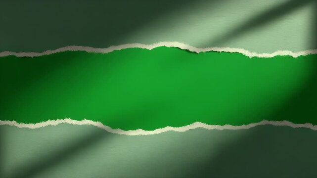 A horizontally torn paper reveals a vibrant green background.