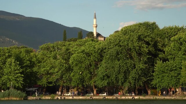 People Walking Lakeside in Ioannina City, Tree Leaves Motion from Wind, Old Town Nature Landscape, Aslan Pasha Mosque in Background, Wide View