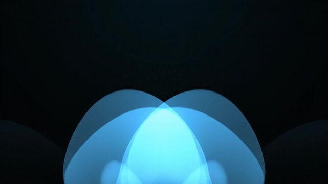 Abstract blue overlapping circles animation displaying smooth light transitions across a dark background for modern creative digital media video projects