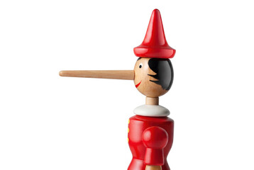 Naklejka premium Handcrafted wooden Pinocchio puppet with a long nose and red hat