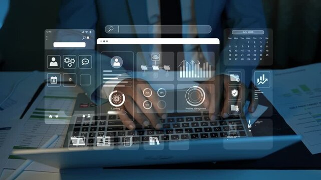 Business person using a laptop with floating hologram digital dashboard screens, data charts and app icons, showing modern technology, online management and office work