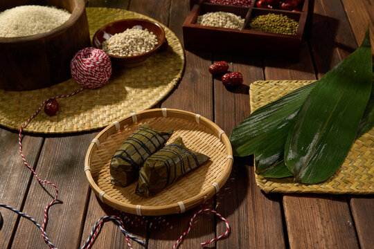 Zongzi Rice Dumplings with Bamboo Leaves and Traditional Ingredients