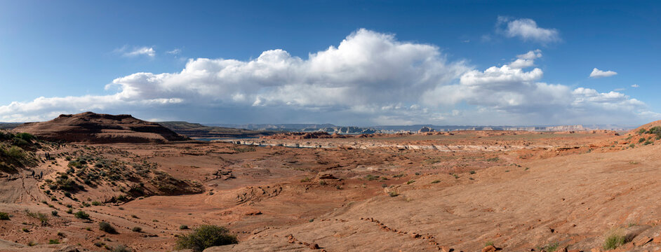 Expansive desert canyon landscape under a cloudy sky