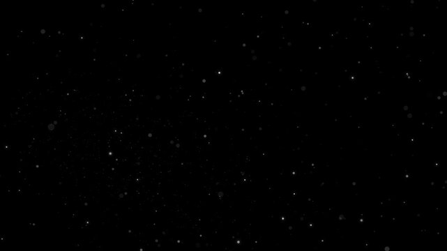 4K floating white dust particles on black background. Ideal overlay video effect.