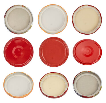 A collection set of various metal jar lids, including red, patterned, and printed twist-off lids viewed from top and bottom perspectives, isolated on a transparent background.